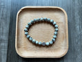 Dalmatian Jasper Bracelet - 8 mm w/ 9 mm Tree of Life